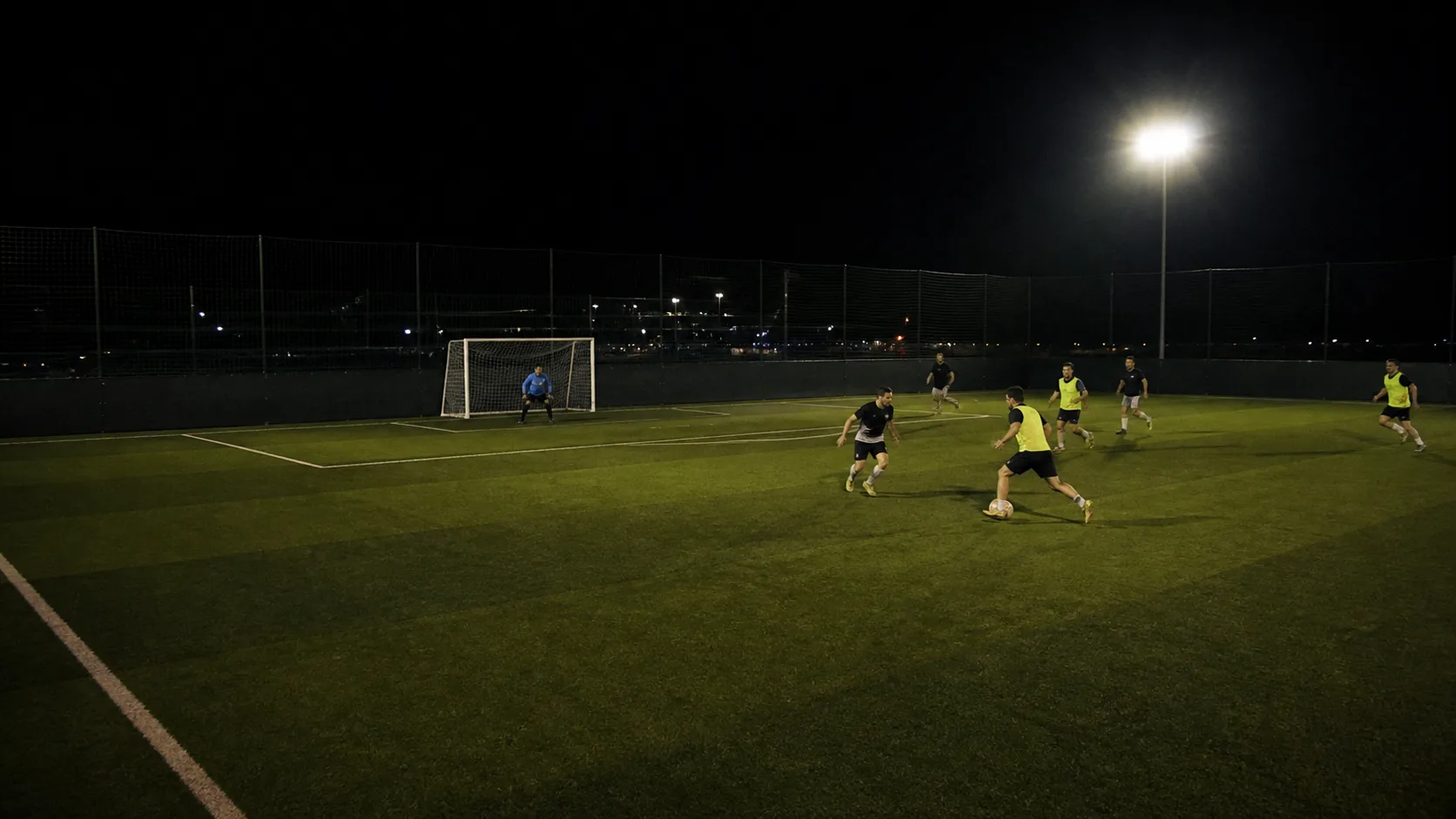 A paused amateur football attack ready for review